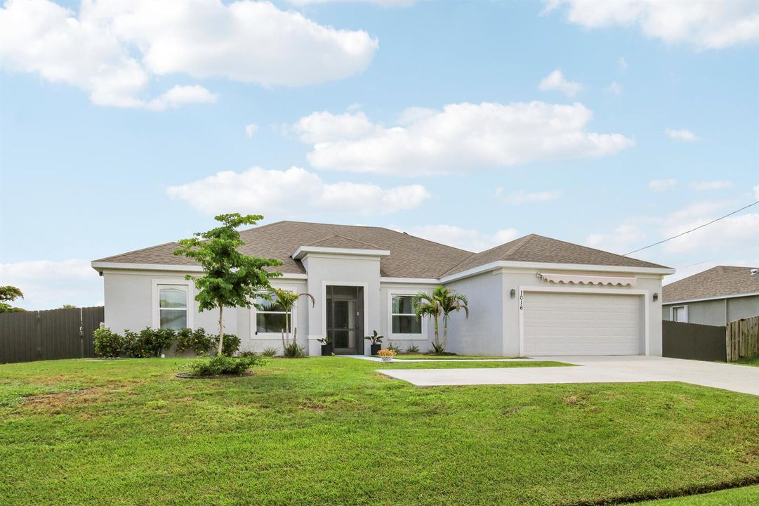 Front Exterior and Spacious Lawn