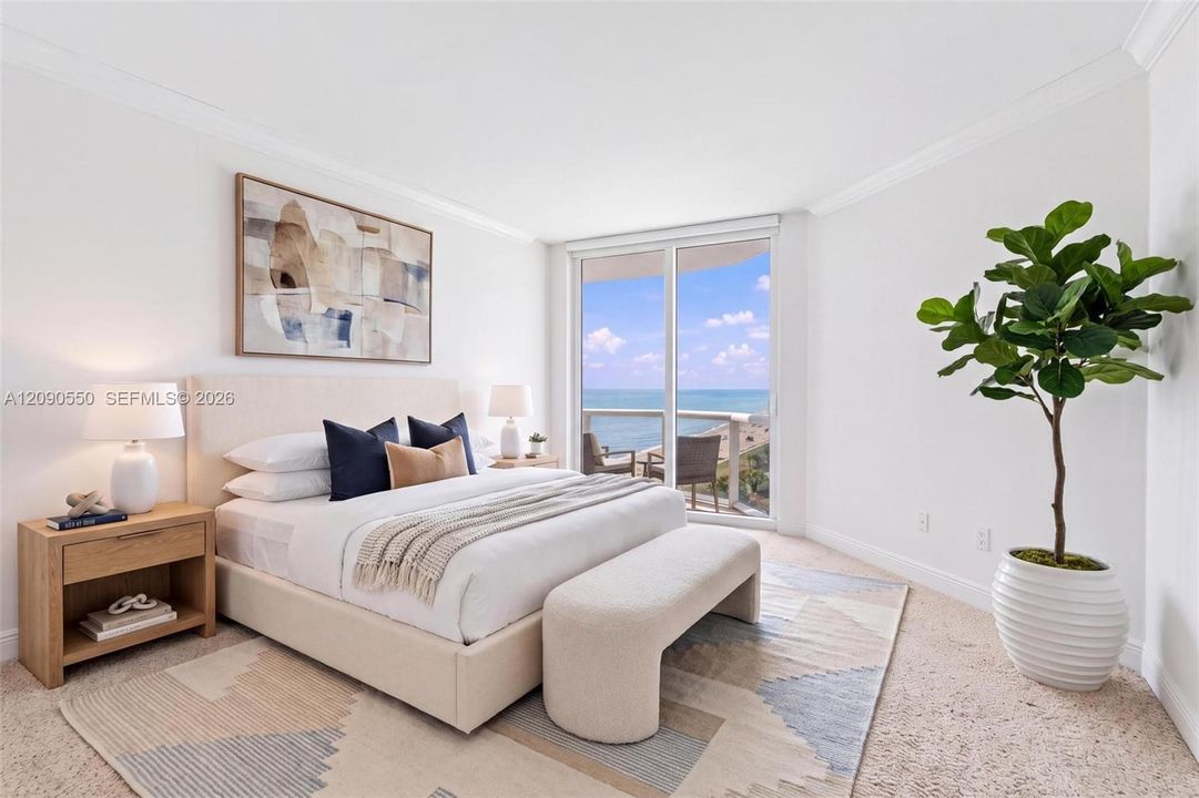Secondary bedroom with private balcony. Photo Virtually Staged.