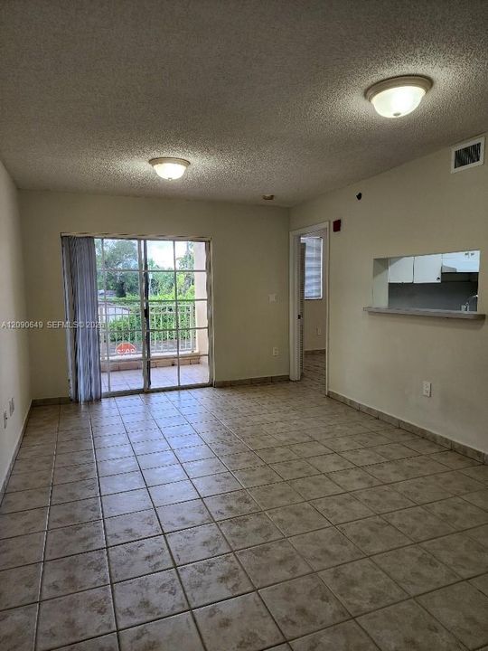 Living Room faces West & very pretty residential Coral Gables neighborhood