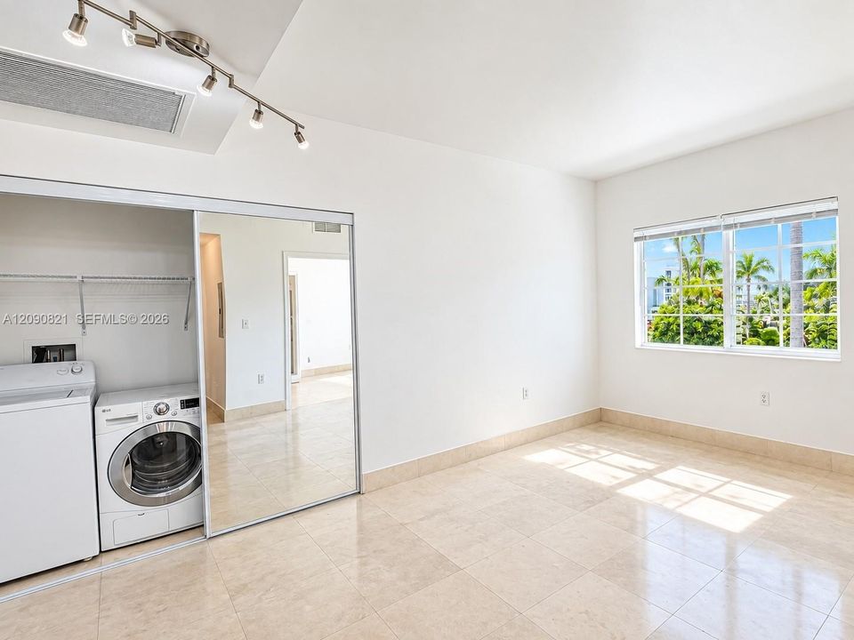 Convenient in-unit washer and dryer setup.Slot 7: Bathroom