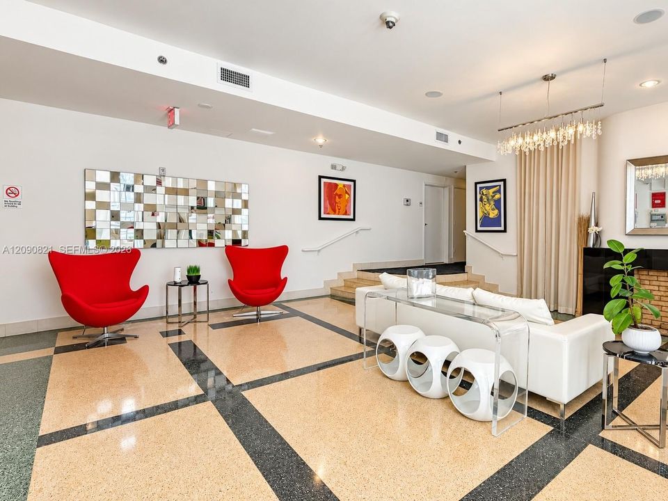 Well-maintained interior building lobby and secure entryway.