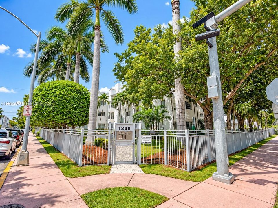 Gated entry and lush green exterior along Pennsylvania Avenue.