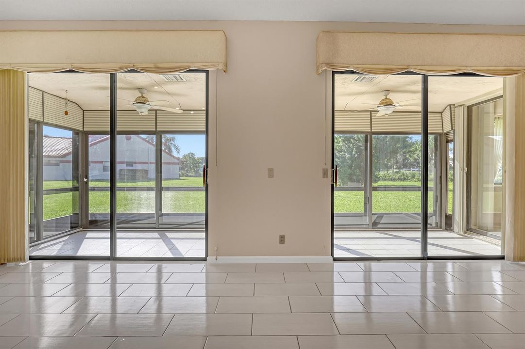 Double doors to the enclosed patio
