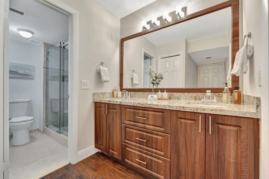 Dual sink granite vanity in primary bath