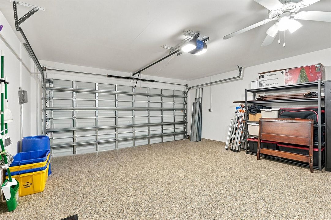 EPOXY FLOORS IN GARAGE W/ NEW DOOR
