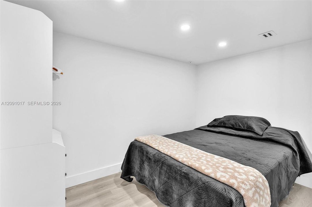 Smaller of 2 bedrooms.