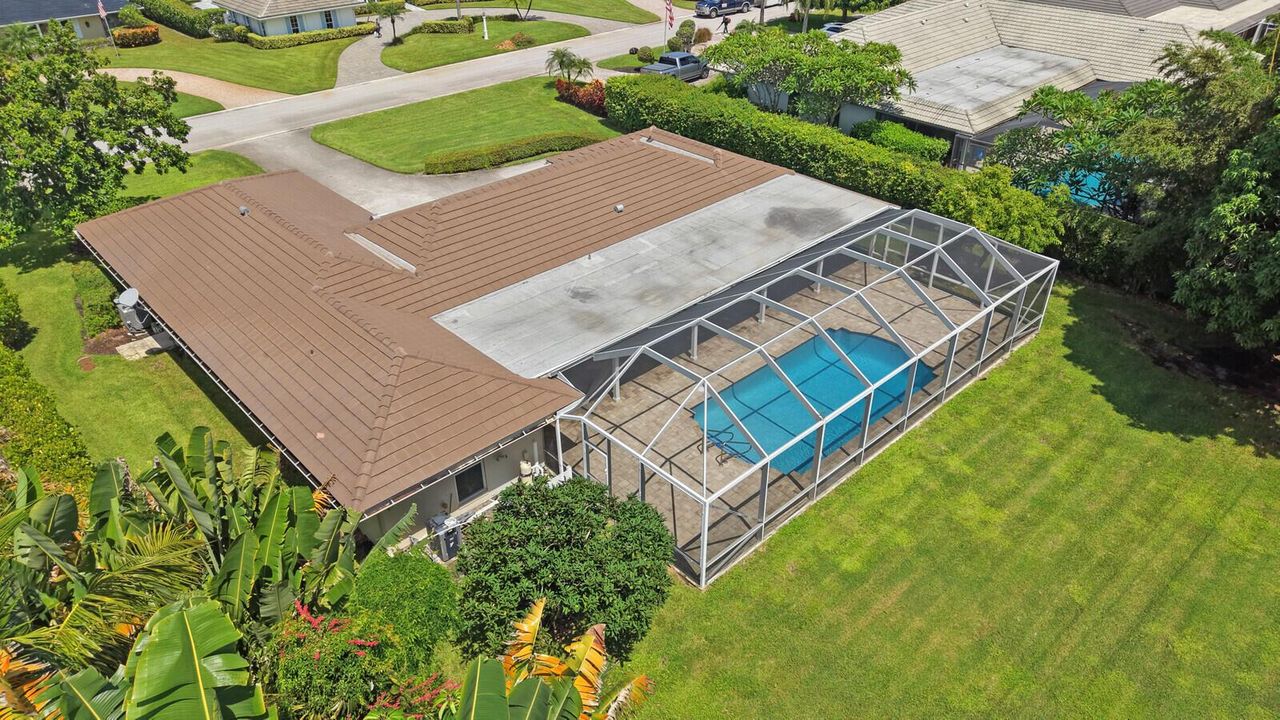 Screened patio/pool plus green space