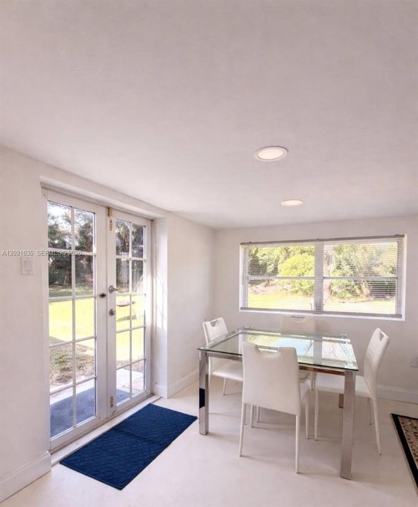 Bright dining space seamlessly connected to the kitchen and living areas for easy hosting.