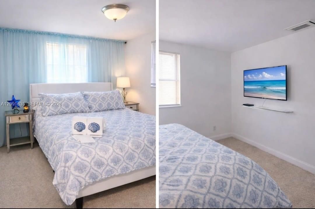 Comfortable primary bedroom offering a tranquil retreat with soft lighting and stylish finishes