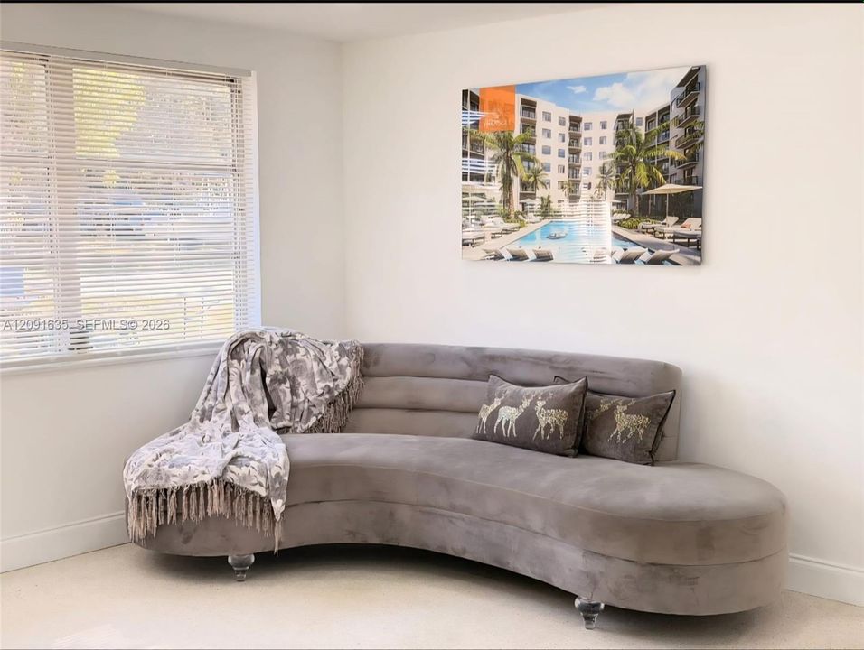 Flexible sitting area or family lounge space perfect for relaxing or reading.