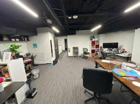 INTERIOR VIEW OF THE MEZZANINE OFFICE AR