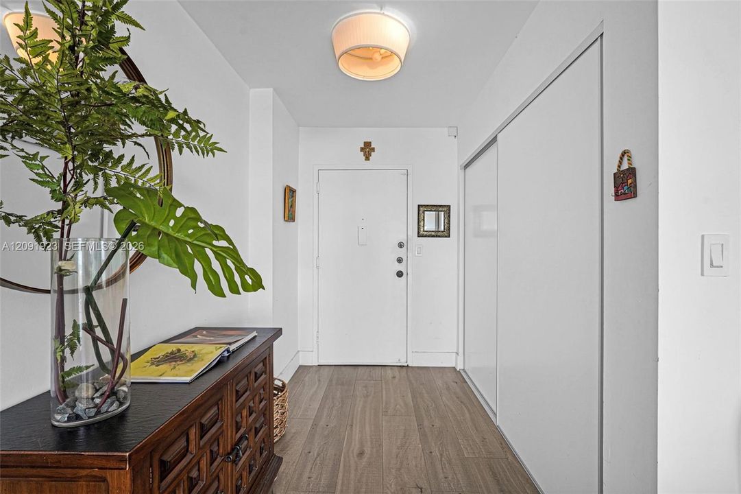 Main entrance with closet space on the right !!