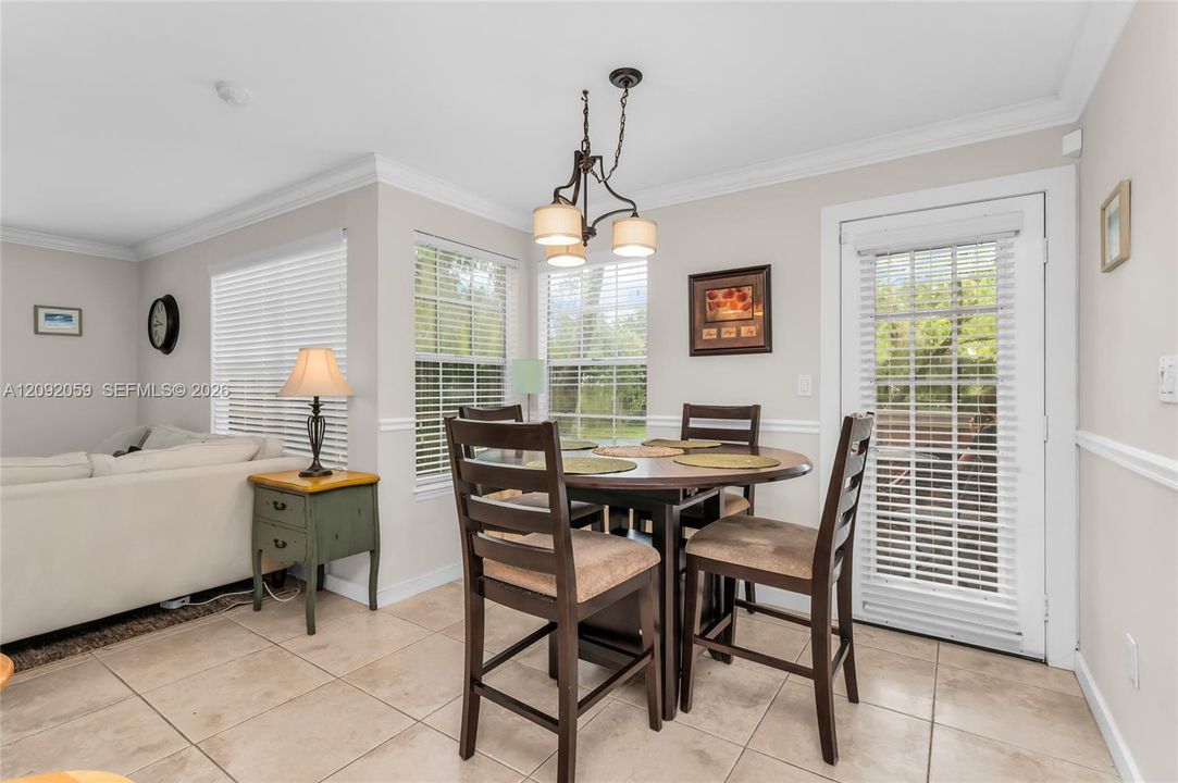 Dining area opens to Porch with water views