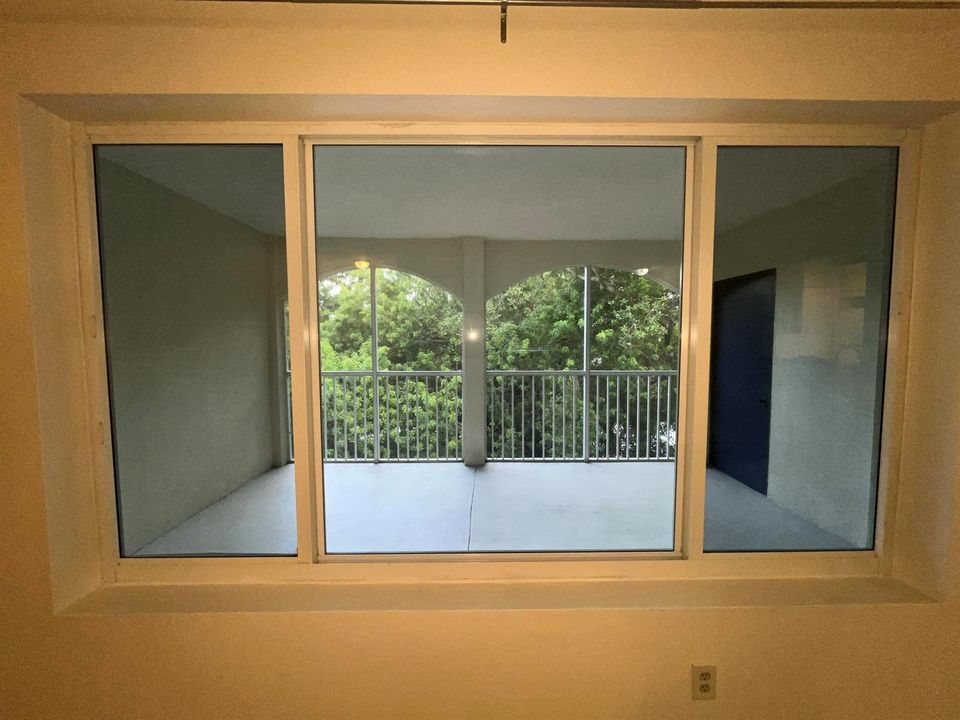 Picture window with view of patio