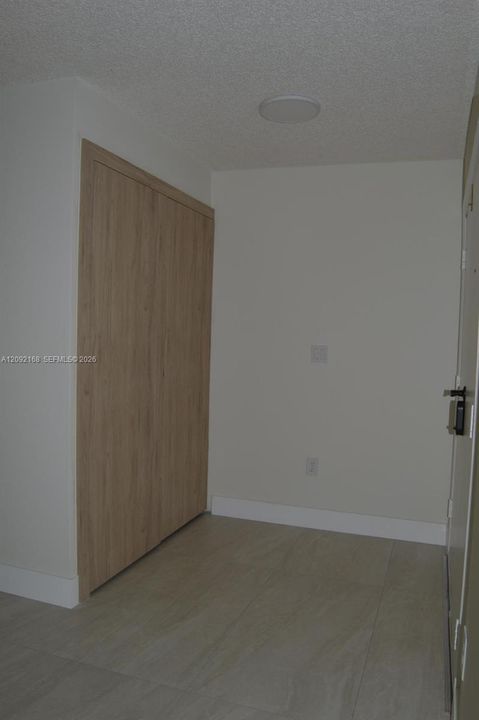 HIDDEN LAUNDRY ROOM FOR WASHER AND DRYER.