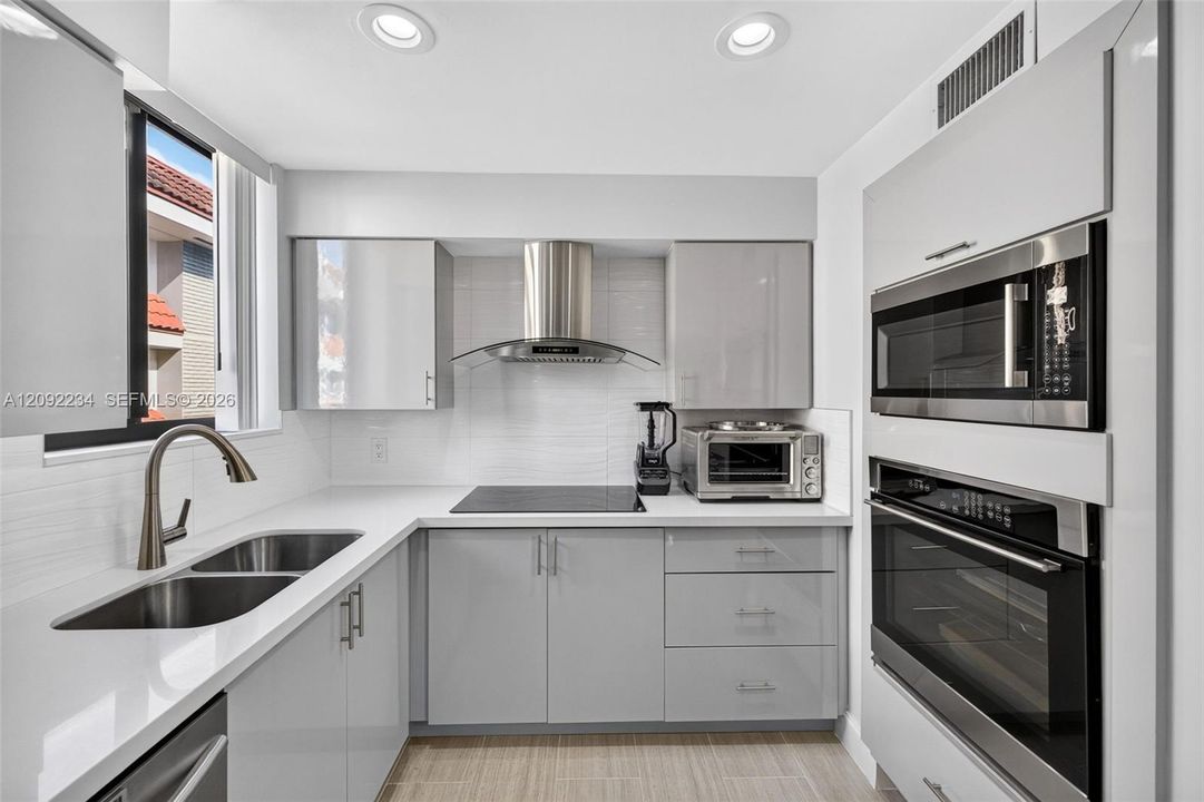 Barely Used Ultra-Modern Kitchen Adds to the High-End Nature of this Townhouse