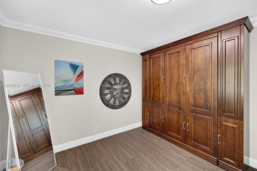 Third Bedroom Comes with a Built in Murphy Bed for Guests.