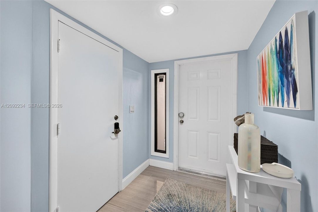 Digital Key Pads on the Garage Entry Door and the Downstairs Storage Closet Make Keys Obsolete