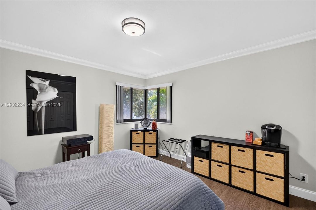Corner Impact Glass Windows in the Second Bedroom Provide Lots of Natural Light