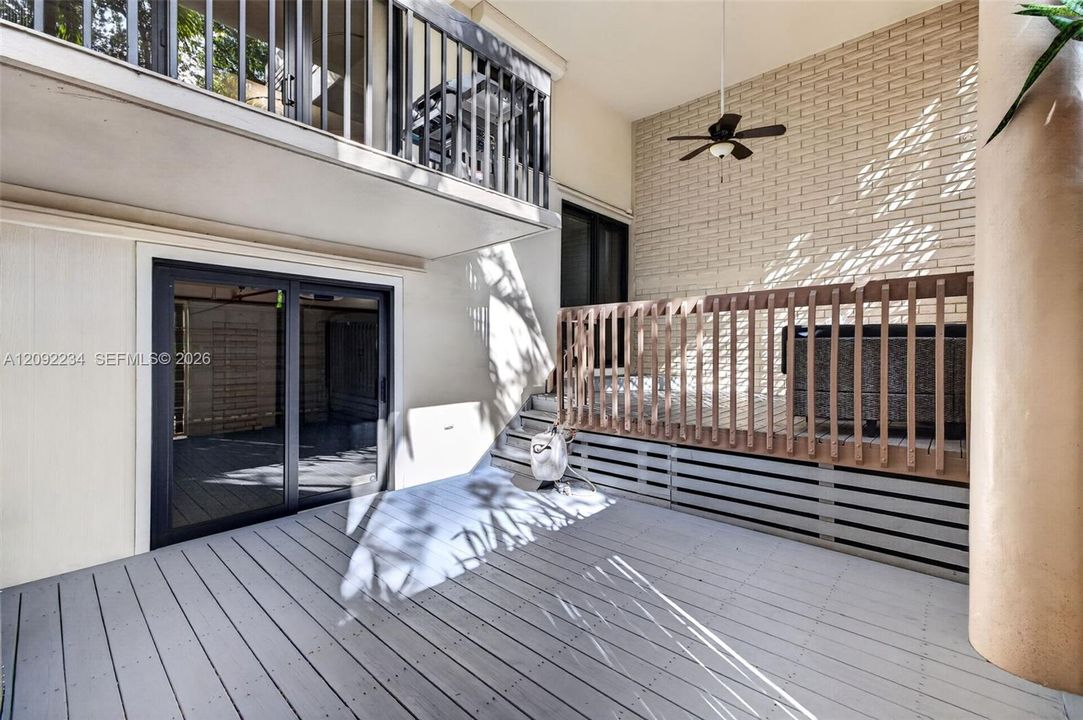 New Wood Patio can also be Accessed through the Garage Impact Sliders