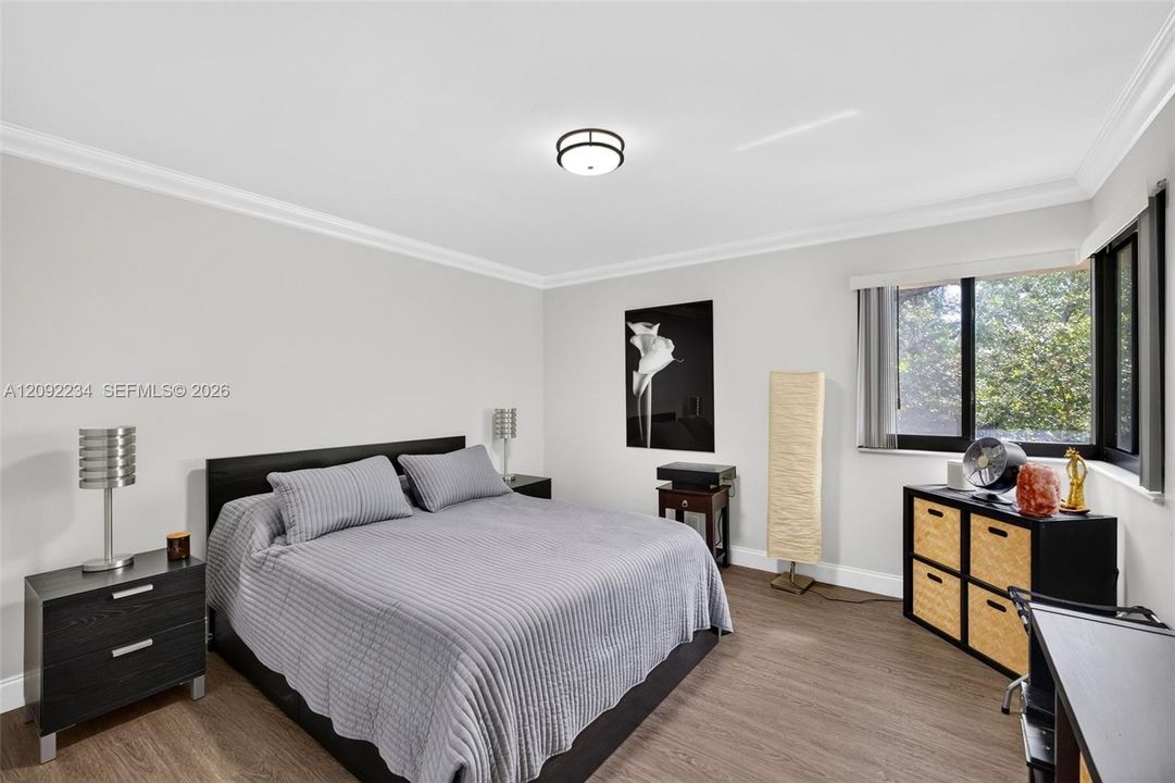 Crown Molding the Second Bedroom Compliments the Upscale Feeling