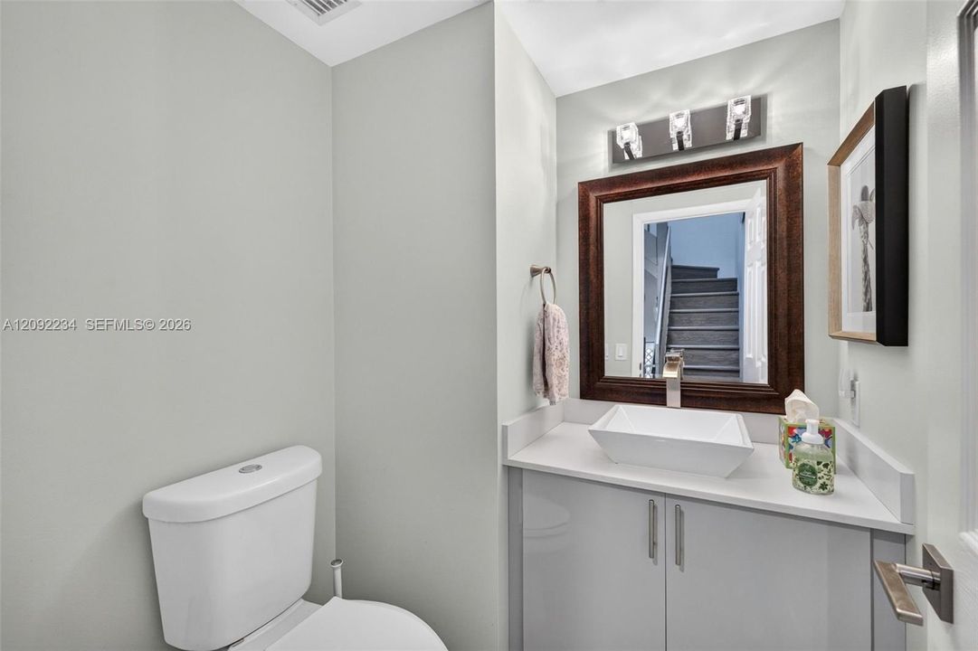 Second Floor Half Bath is Convenient for Guests and Beautifully Renovated