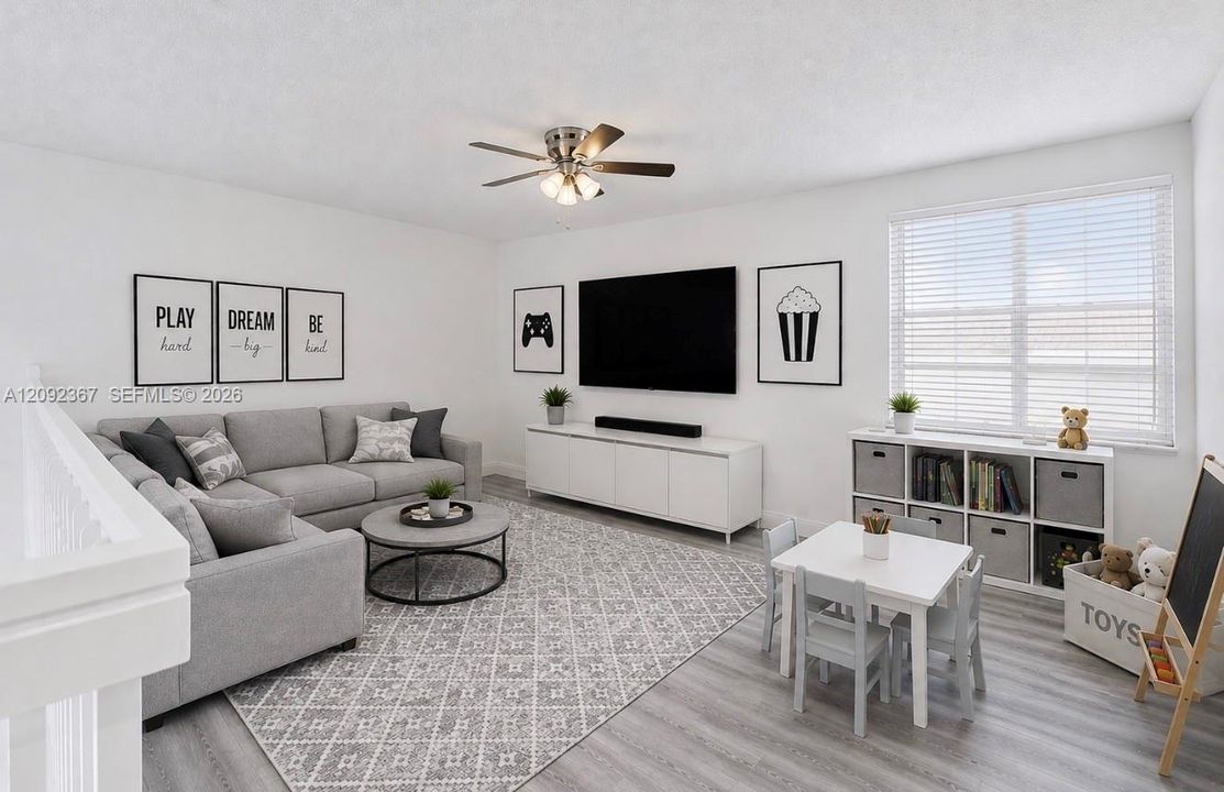 VIRTUALLY STAGED - Large Loft Upstairs staged with family room/ play room.