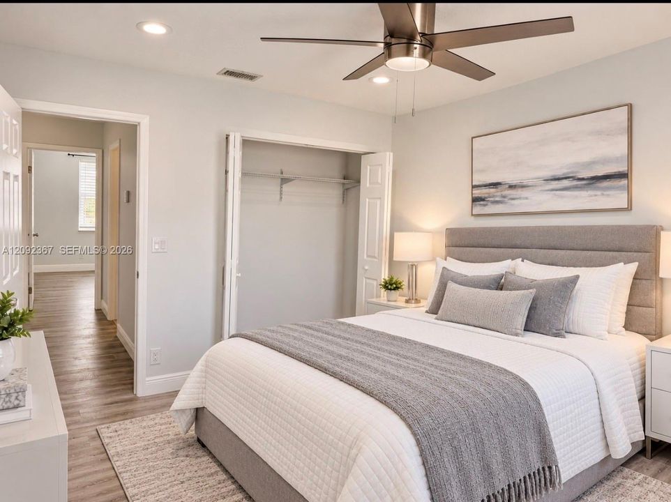 VIRTUAL STAGED - Upstairs Front Bedroom with Closet.