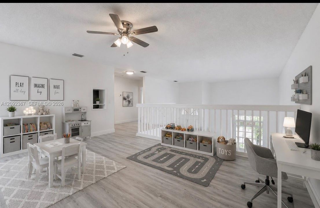 VIRTUALLY STAGED - Other Side of  Large Loft Upstairs staged for Office/Play area.