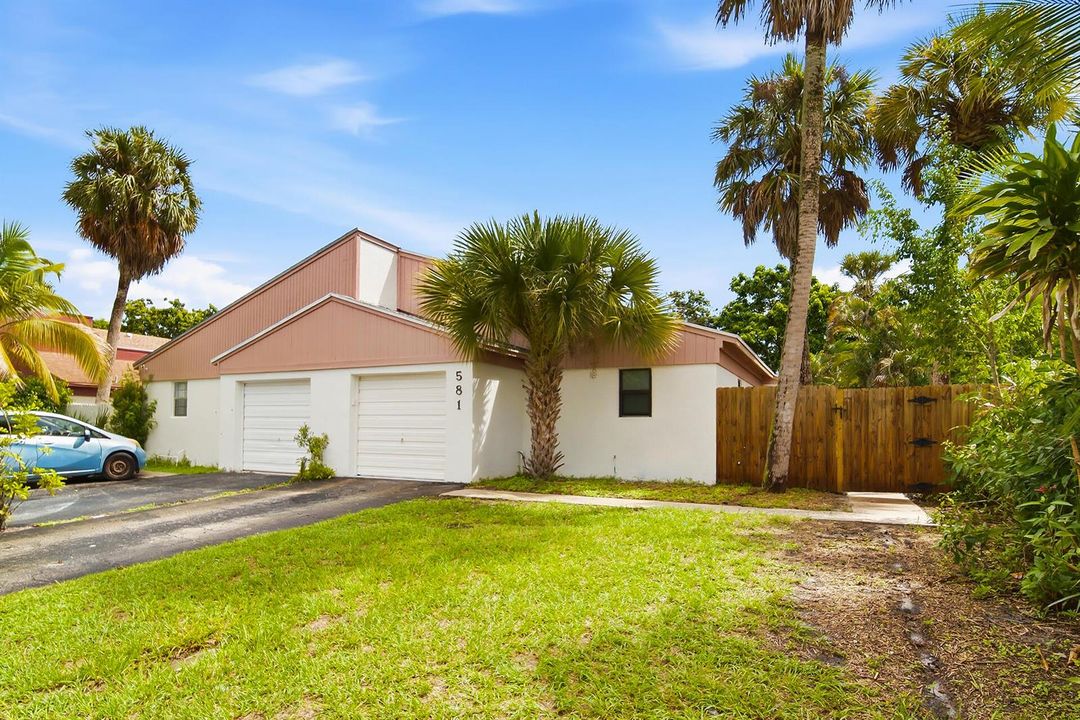 581-NW-47TH-AVE-33445-001