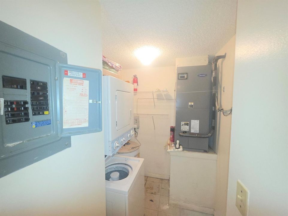 CLOSET LAUNDRY AC ELEC PANEL AND WATERTA