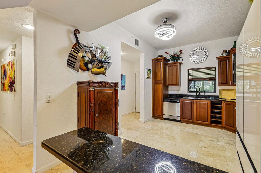 8-web-or-mls-Presidential Way #310-S1809