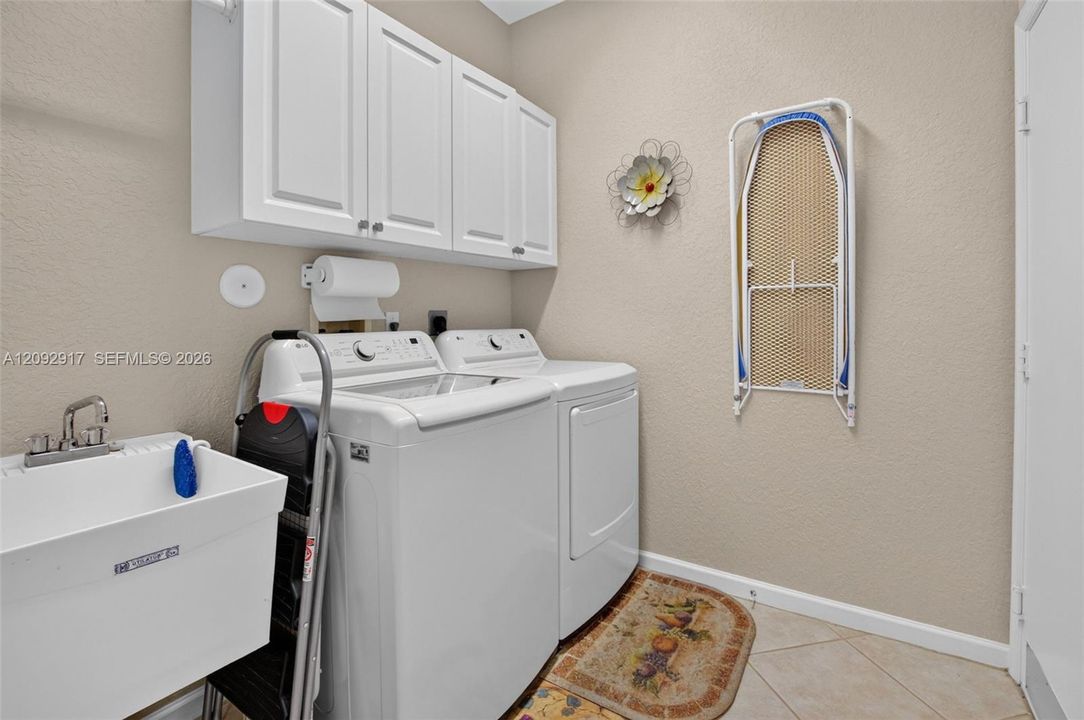 Laundry room with utility sink.