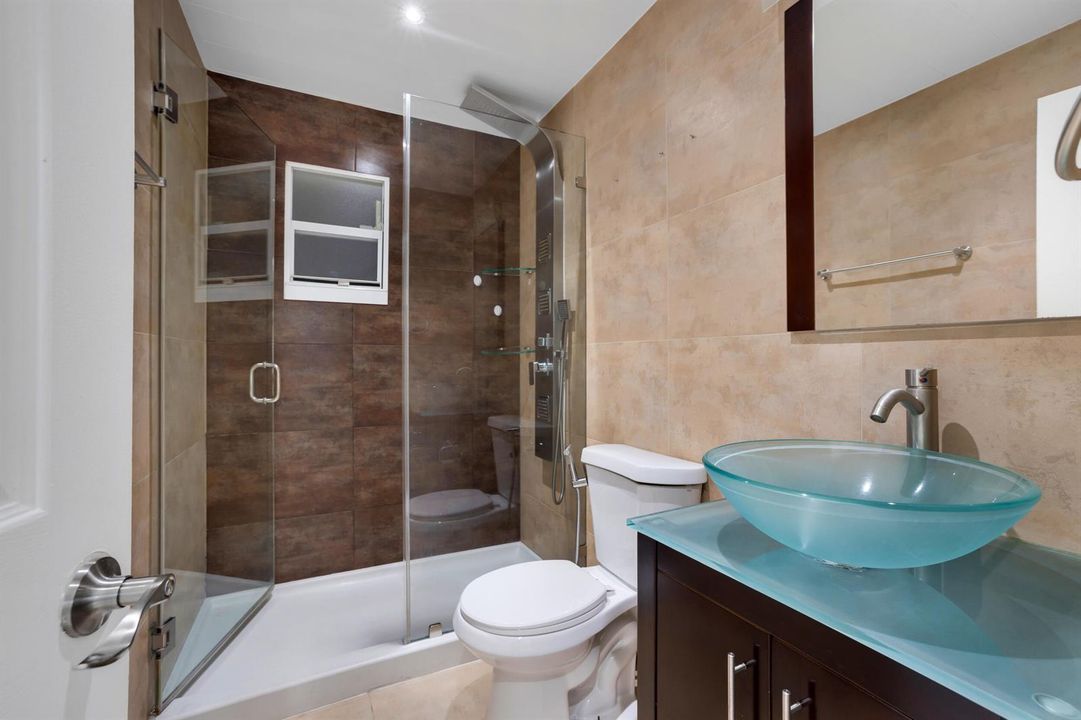Bathroom with Glass-Enclosed Shower