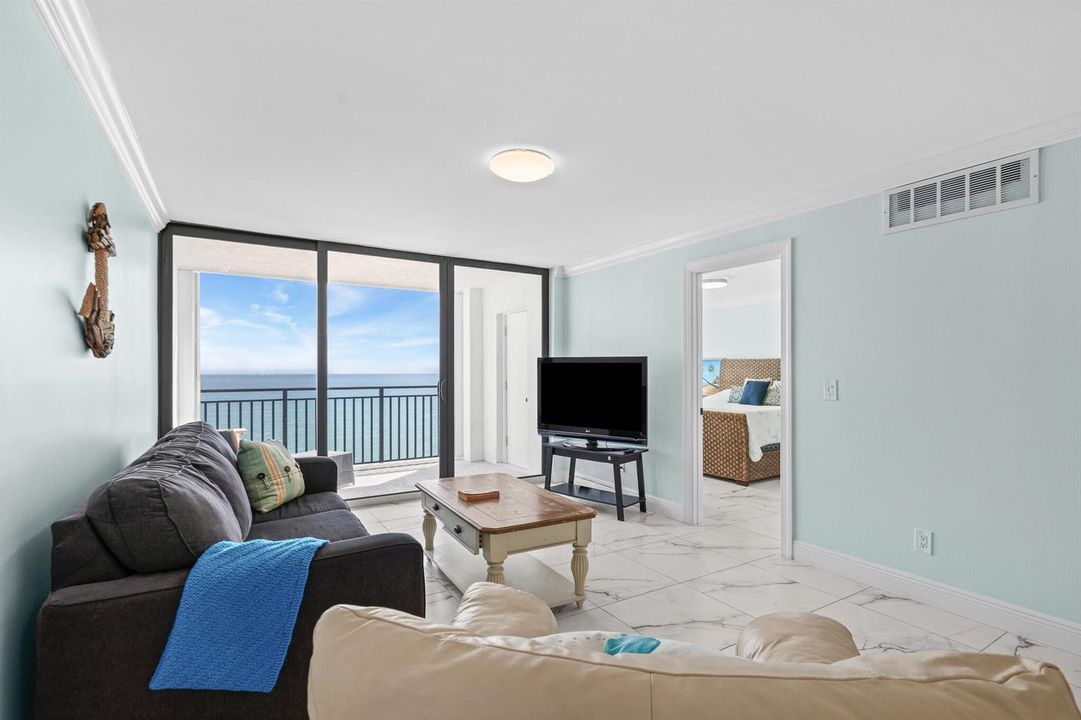 Living room w/ balcony