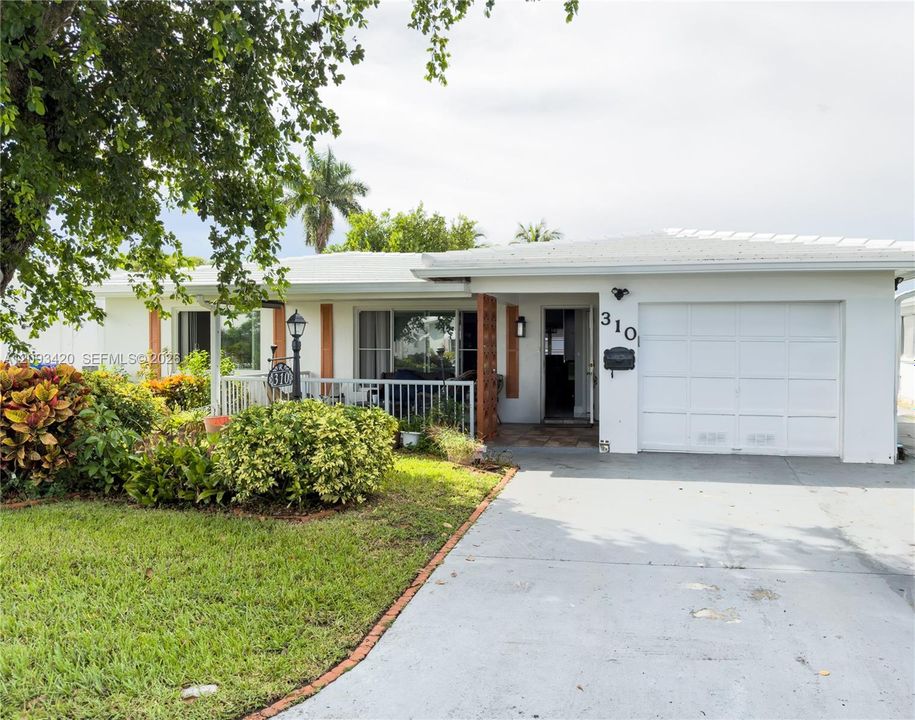 310 NW 25th Ct
