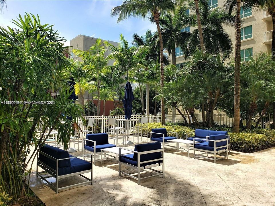 Lounge areas around pool deck.