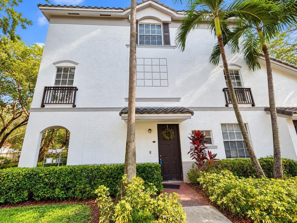 Inviting Tropical Townhouse Entrance