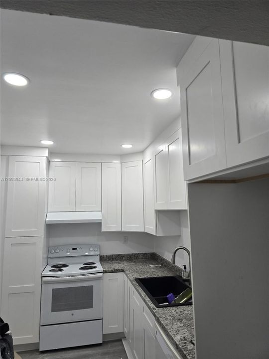 Lots of cabinets and new appliances!