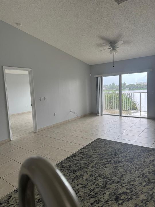 view from kitchen to living and balcony