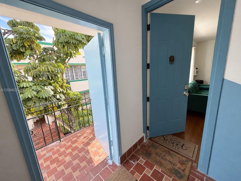 Main Entry to both Private Balcony (Left) and Apartment (Right) (AI edited photo)