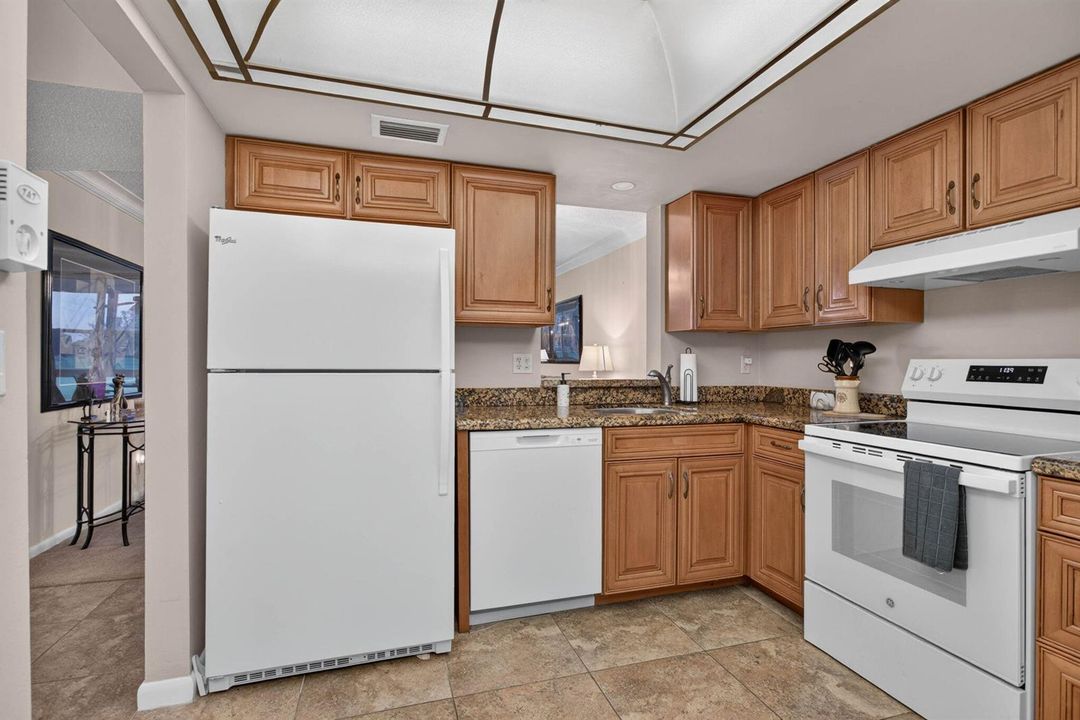 GRANITE COUNTERS WOOD CABINETS