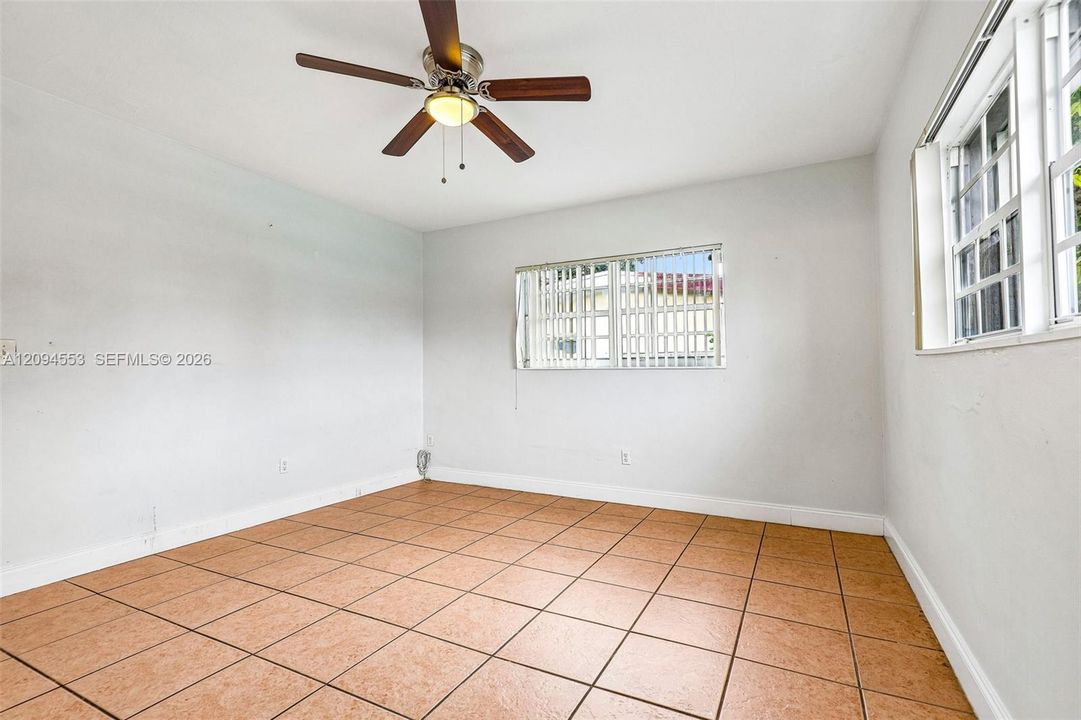 Primary bedroom, unstaged (same room as photo 4)