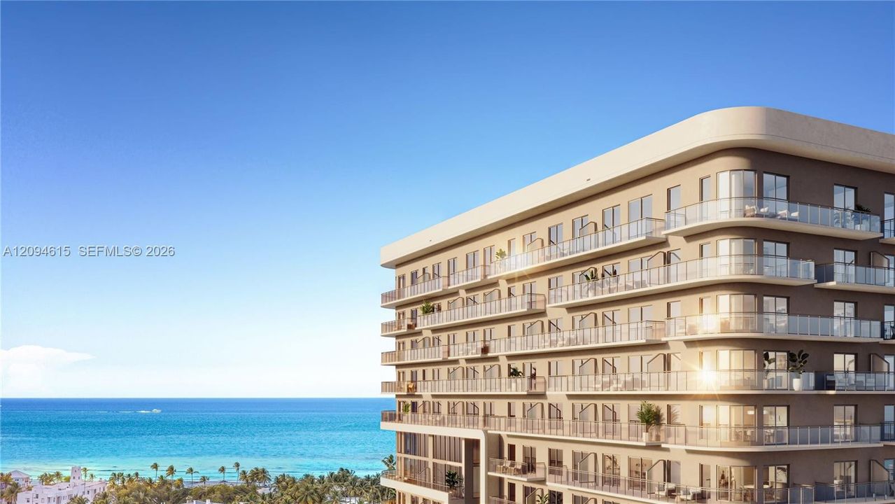 Multi-story residential building featuring rounded architectural corners, full-length private balconies with glass railings, and expansive floor-to-ceiling windows