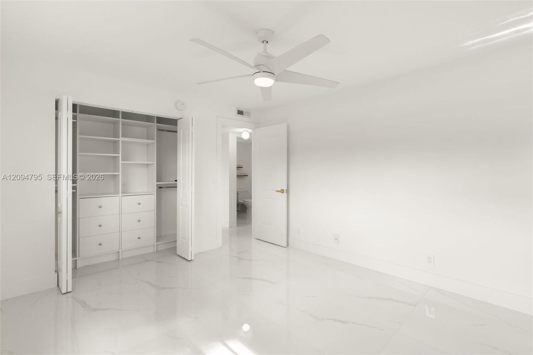 Built in closet in primary bedroom