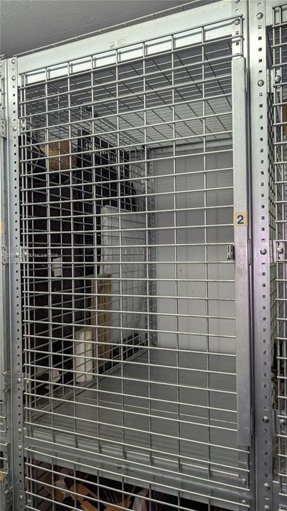 Secure, metal-grid storage unit with a reinforced frame and dedicated identification numbering