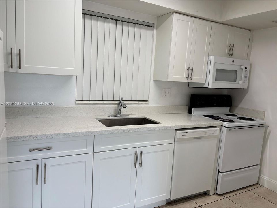 Complete kitchen with microwave