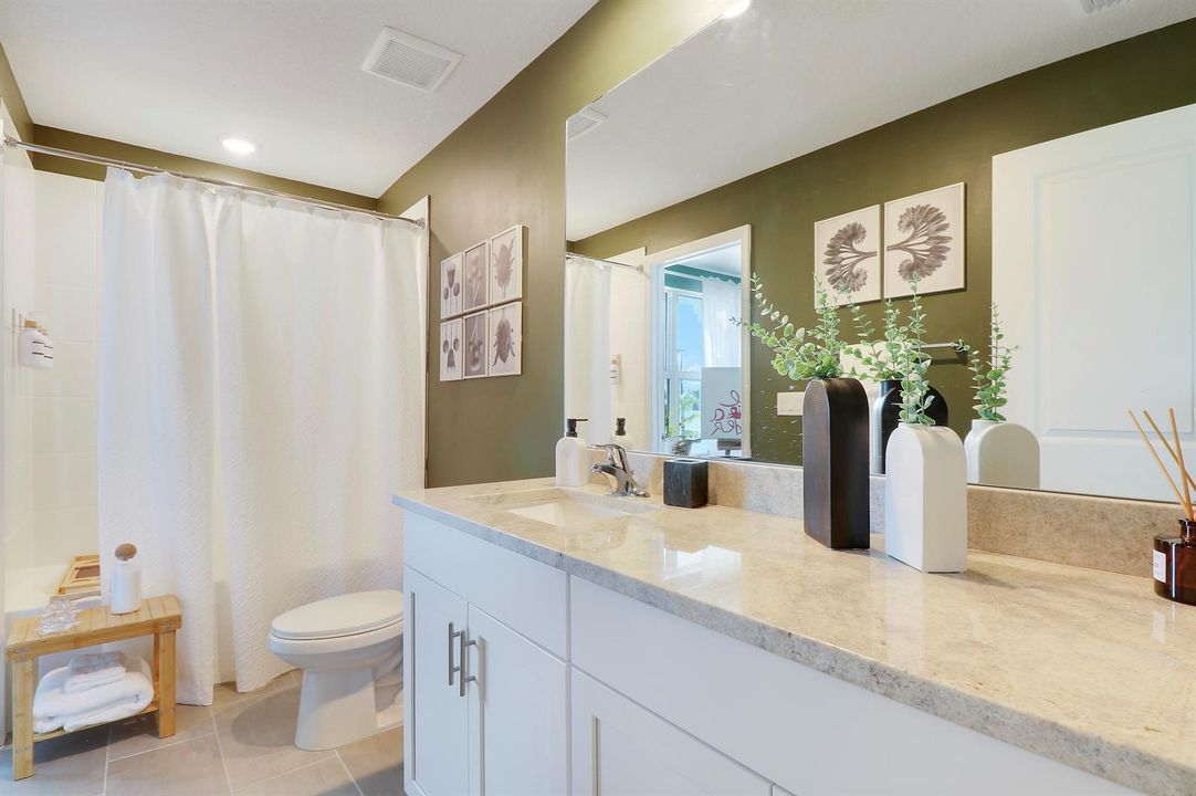 Bathroom with green accent wall