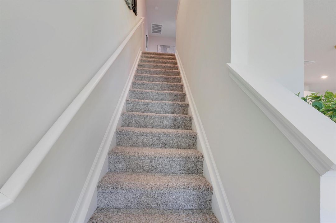 Staircase with wood banister