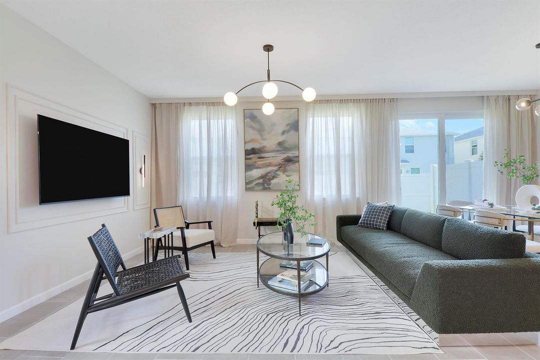 Living room with sofa and TV wall